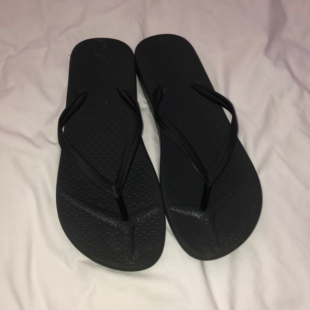 Black flip flops